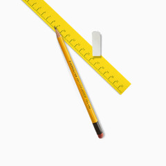 黄色铅笔尺子和橡皮