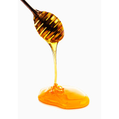 创意搅棒上滴落的蜂蜜