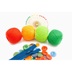 彩色的毛线团纽扣拉链和针