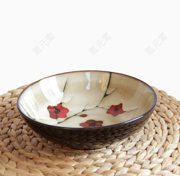 防烫垫上的梅花碗