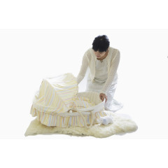 妈妈和婴儿床上的宝宝