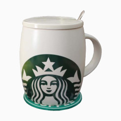 带杯垫和勺子的星巴克杯子