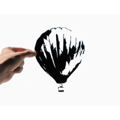 手中的热气球创意剪纸艺术