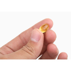 手拿鱼油胶囊图片